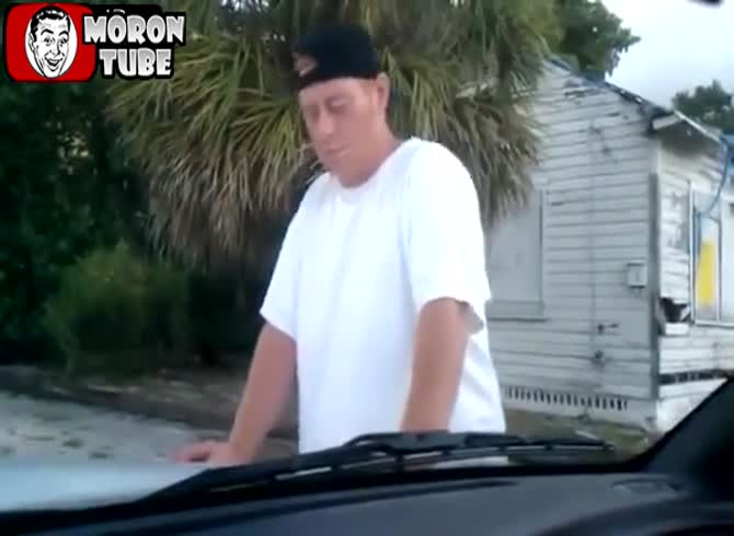 Video :He falls asleep on the hood of a police cruiser while intoxicated